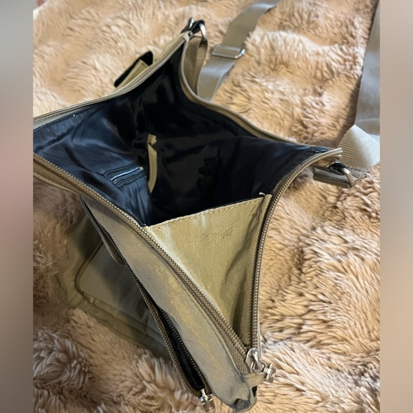 Tan athletic type nylon crossbody bag with tons of pockets - Picture 4 of 4